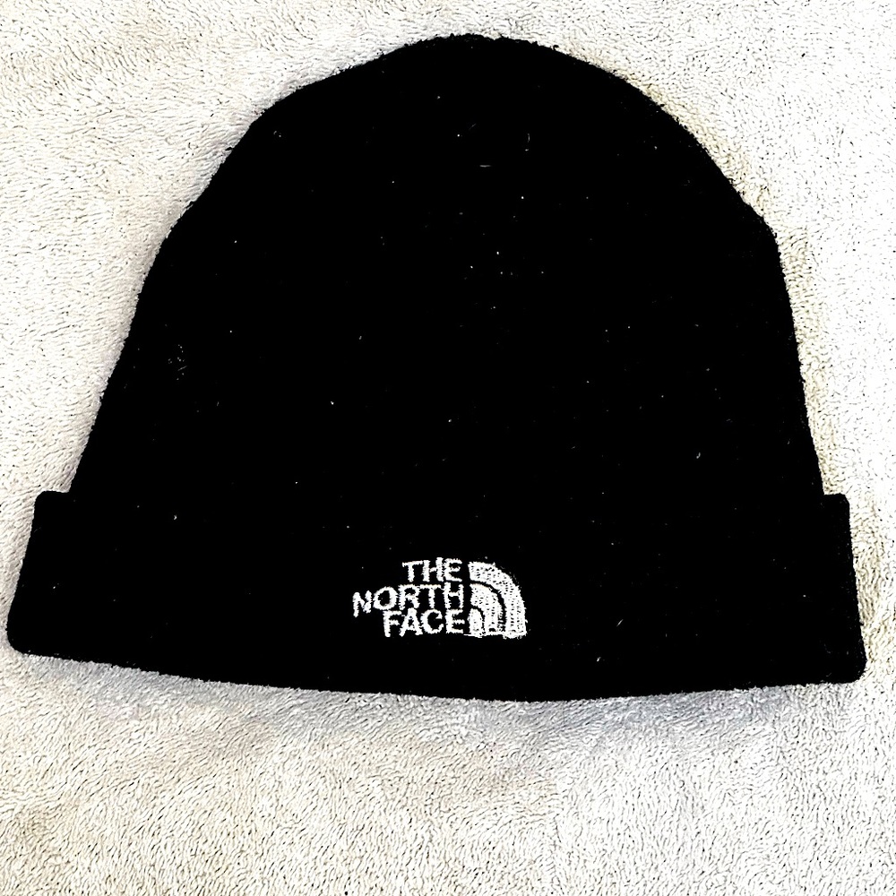 The North Face beanie black with white logo size one size fits you probably